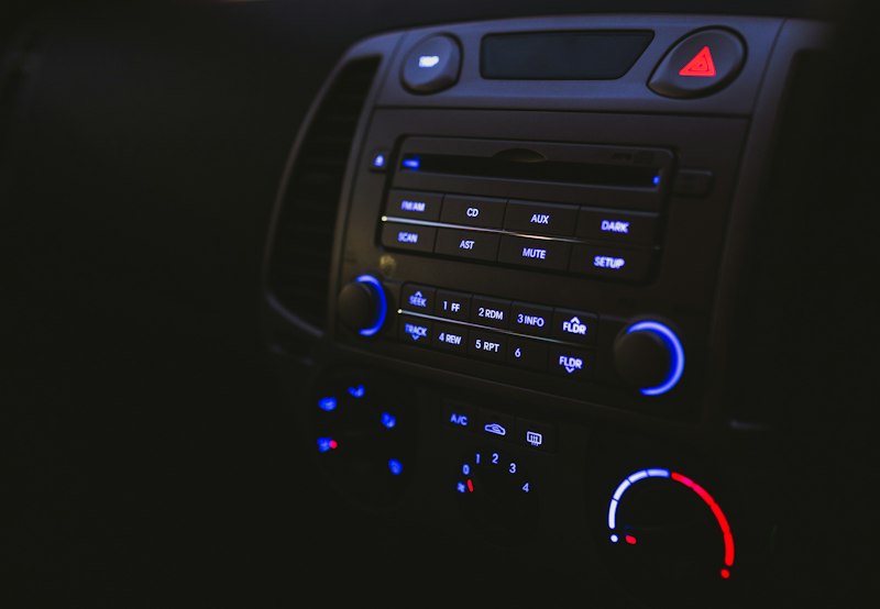 Illuminated car audio head unit at night
